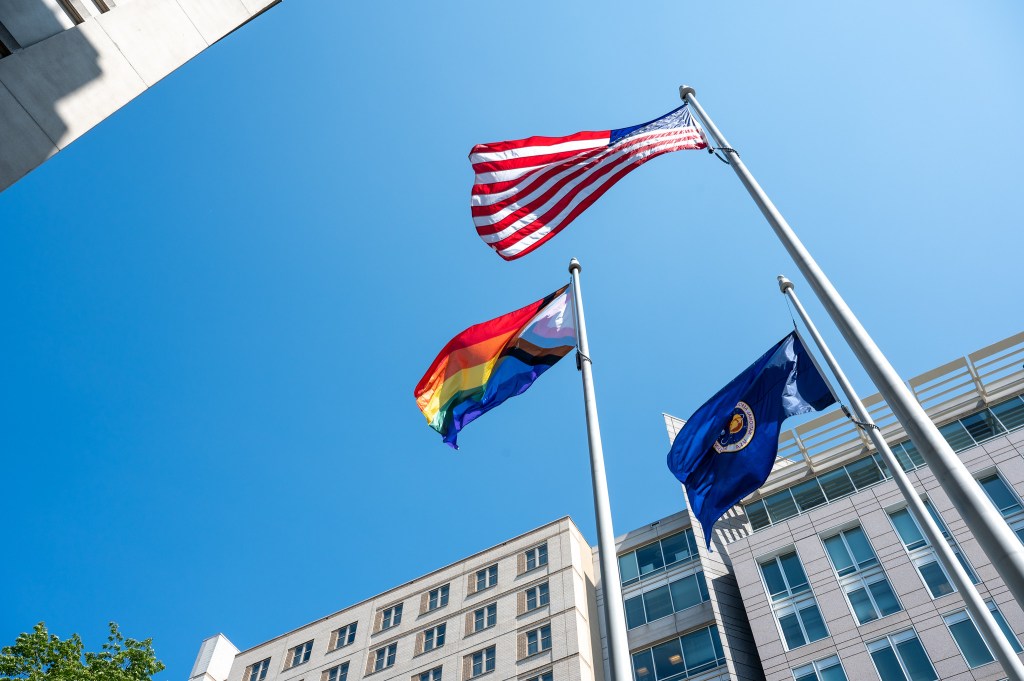 The Pride Progress Flag is seen waving in the wind following a flag raising ceremony in recognition and celebration of LGBTQI+ Pride Month at the Mary W. Jackson NASA Headquarters building in Washington on June 1, 2023.