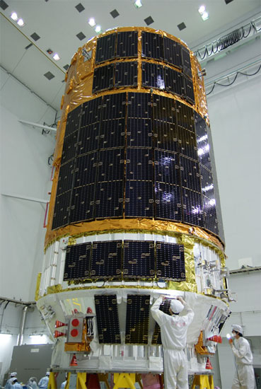 View of the HTV-1 Kounotori cargo spacecraft during prelaunch processing at the Tanegashima Space Center in Japan