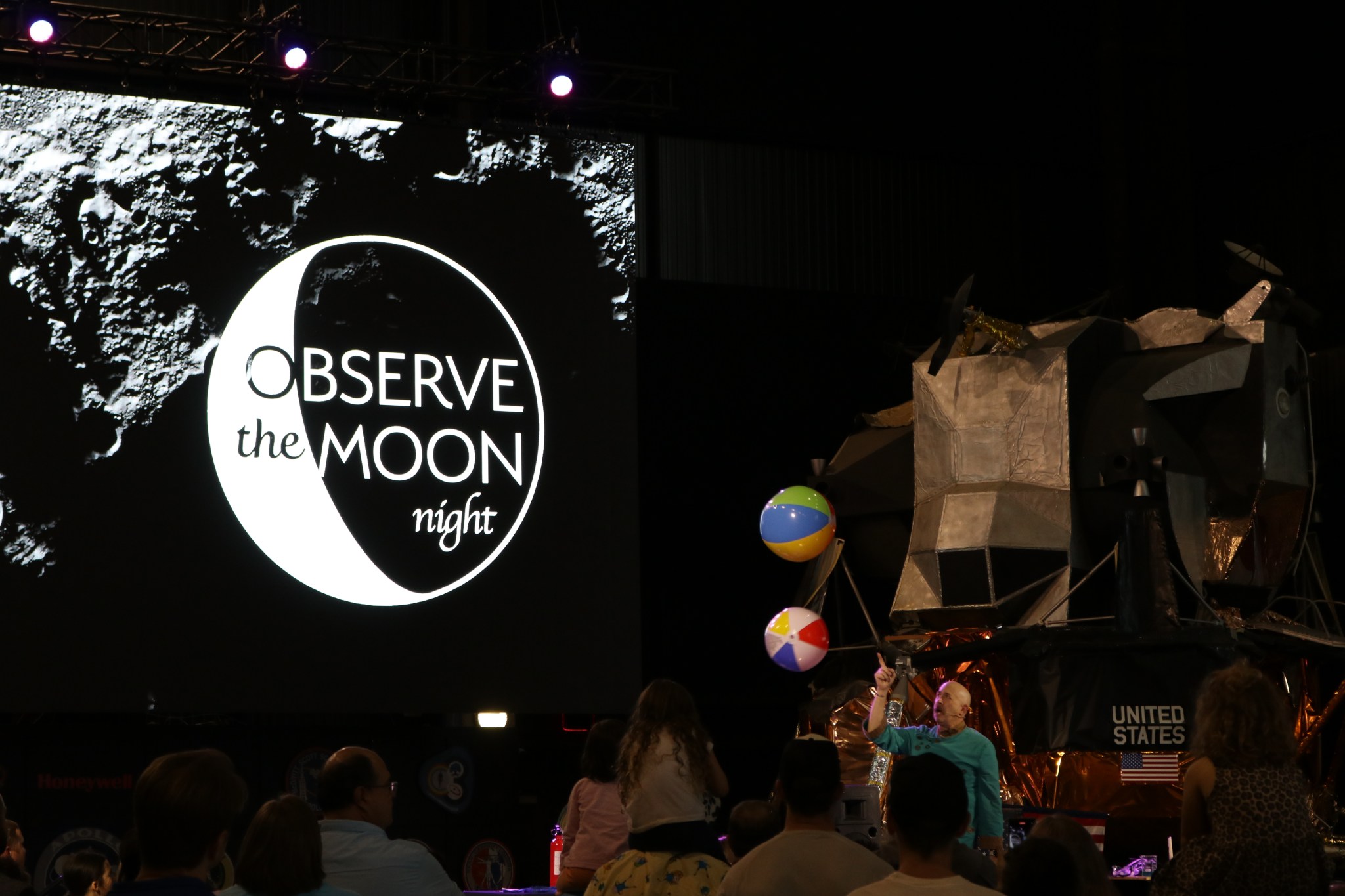 The Science Wizard, David Hagerman, right center, entertains the crowd with one of his shows Sept. 14 during Observe the Moon Night at the U.S. Space & Rocket Center in Huntsville. The free public event was part of International Observe the Moon Night, a worldwide celebration encouraging observation, appreciation, and understanding of the Moon and its connection to NASA exploration and discovery. NASA’s Planetary Missions Program Office hosted the event at the rocket center. The Planetary Missions Program Office is located at NASA’s Marshall Space Flight Center.