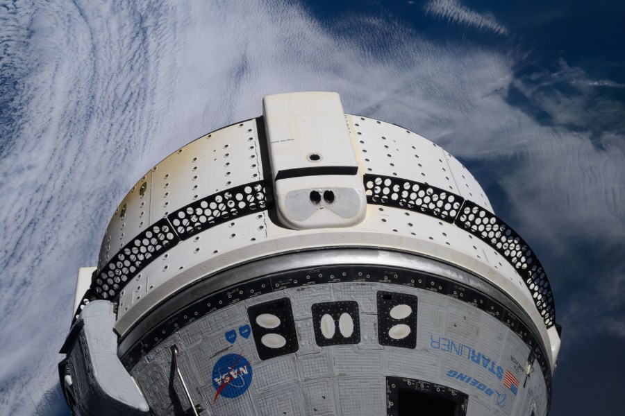 iss071e193498 (June 15, 2024) -- Boeing's Starliner spacecraft is pictured docked to the International Space Station's forward-facing port of the Harmony module as the orbiting lab soared 264 miles above the Atlantic Ocean.