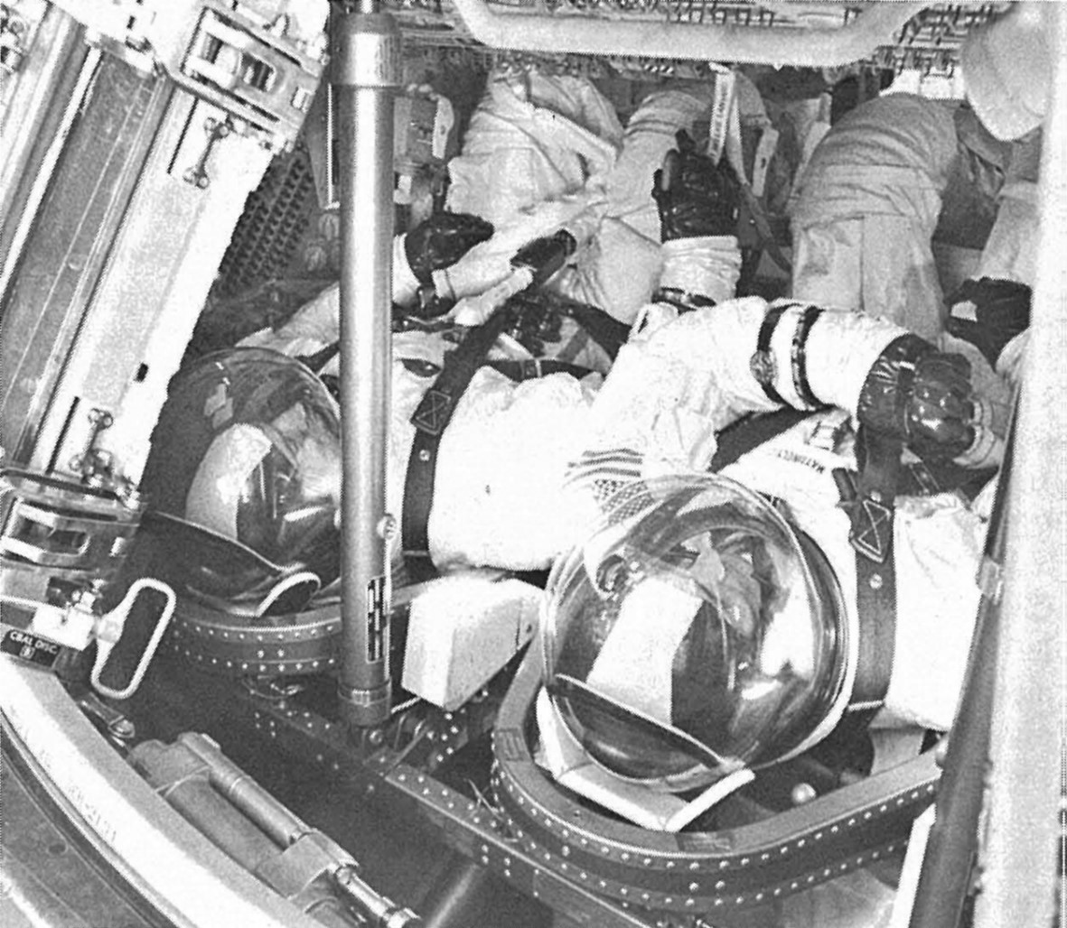 Apollo 13 prime crew members James A. Lovell and Thomas K. “Ken” Mattingly in the Command Module (CM) for an altitude chamber test – Fred W. Haise is out of the picture at right – at NASA’s Kennedy Space Center in Florida