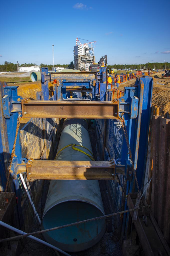 Crews use a shoring system to hold back soil as they install new 75-inch piping leading from the NASA Stennis High Pressure Industrial Water Facility to the valve vault pit serving the Fred Haise Test Stand.