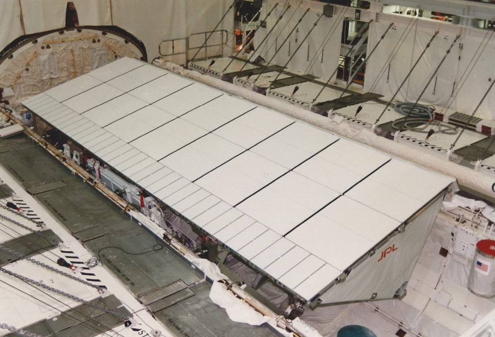 The Spaceborne Imaging Radar-C (SIR-C) in Endeavour’s payload bay in the Orbiter Processing Facility at NASA’s Kennedy Space Center in Florida