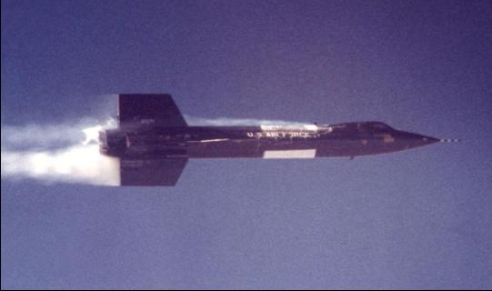 Pilot A. Scott Crossfield has ignited all eight of the X-15's engines to begin the powered flight. 