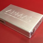 Silver thin rectangular box with ARMA engraved on top.