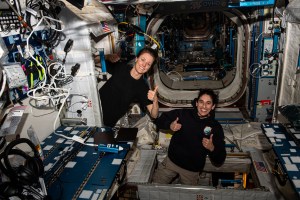 Expedition 70 Flight Engineers (from left) Loral O'Hara and Jasmin Moghbeli, both NASA astronauts who also reside in Texas, give a thumbs up after voting from the International Space Station. The duo filled out electronic absentee ballots that were downlinked to Mission Control Center in Houston, Texas, then sent to the county clerk's office.