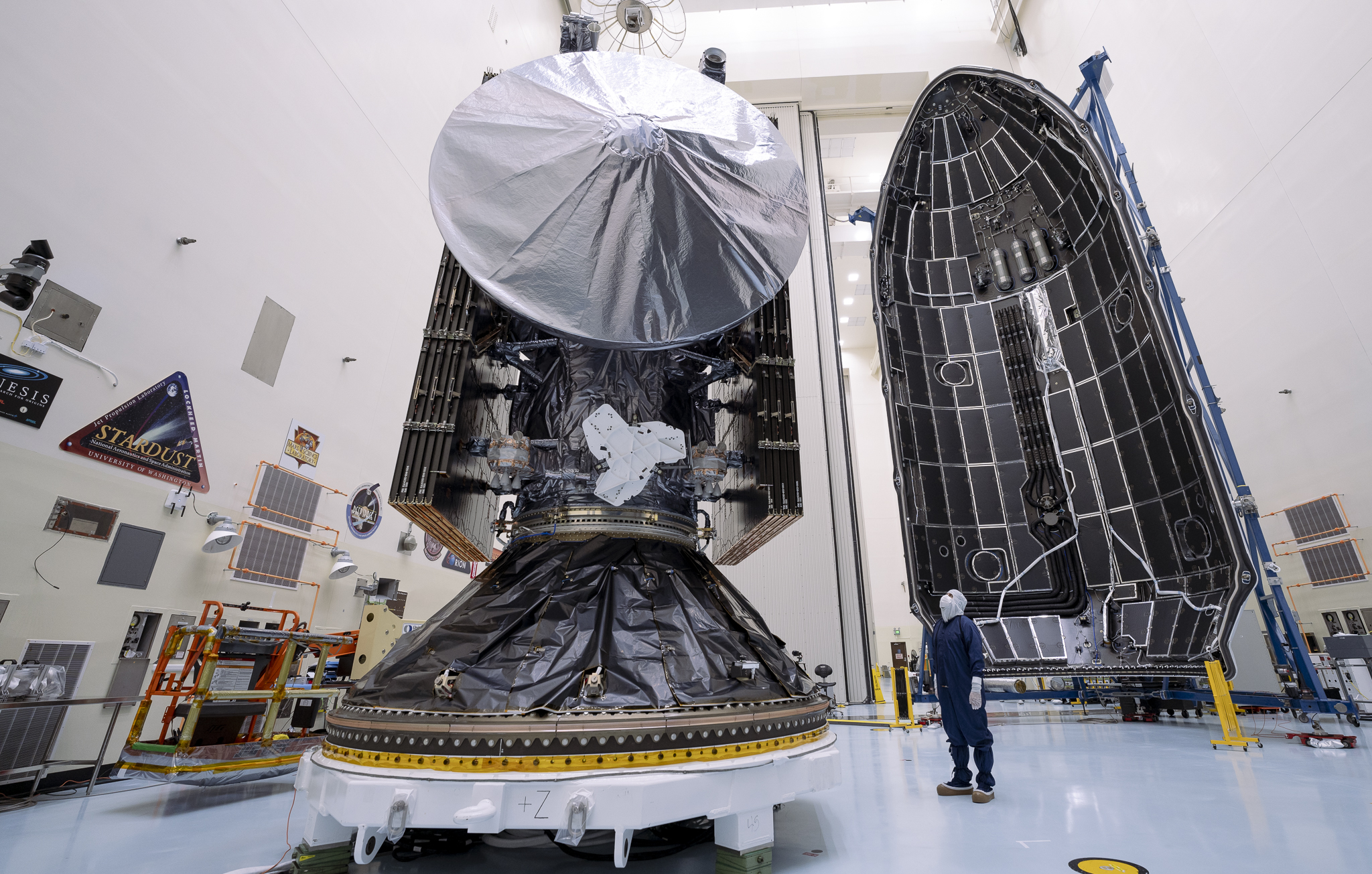 Technicians prepare to encapsulate NASA’s Europa Clipper spacecraft inside SpaceX’s Falcon Heavy payload fairing in the Payload Hazardous Servicing Facility at NASA’s Kennedy Space Center in Florida on Oct. 2, 2024.