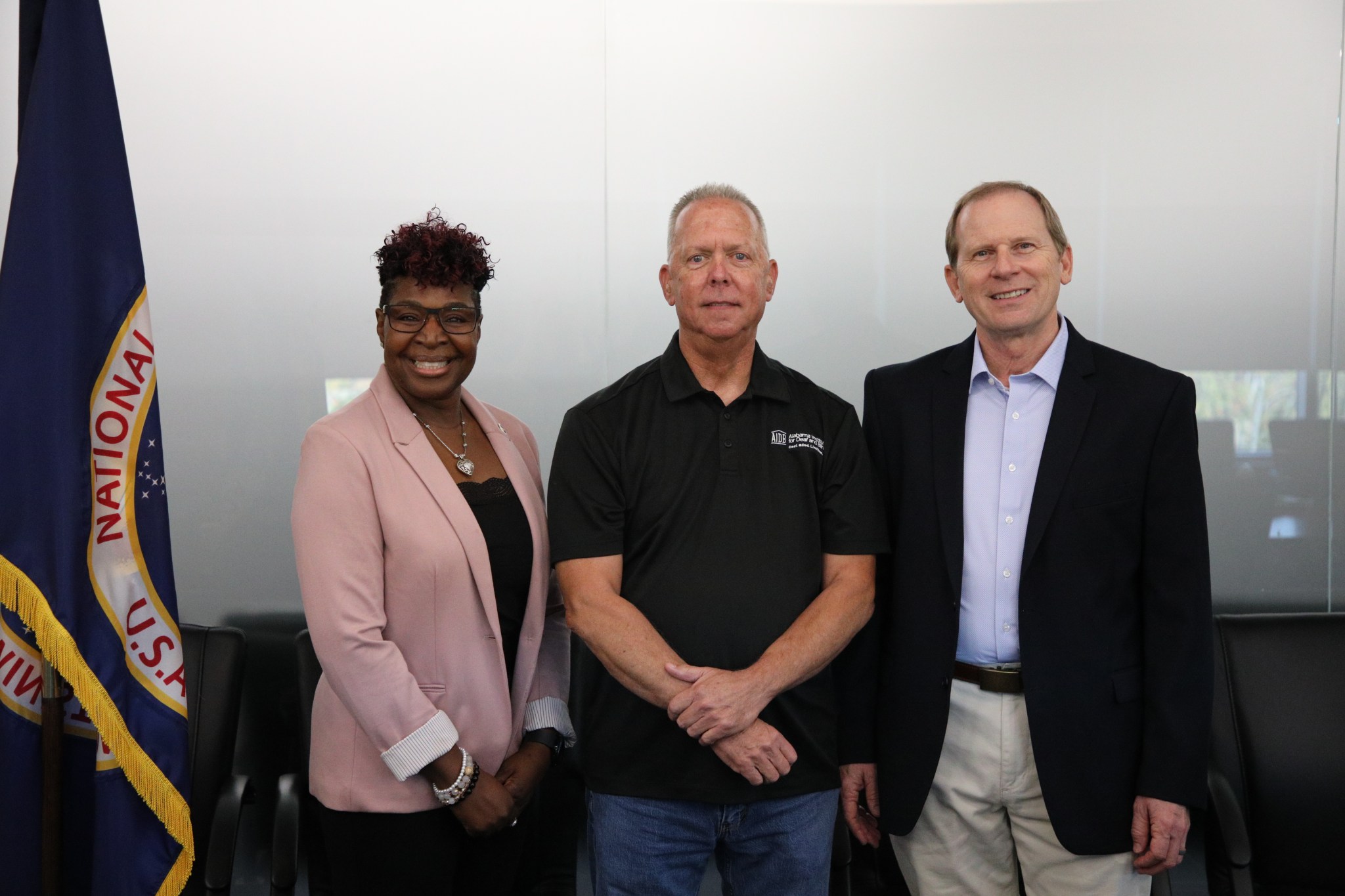 From left, Tora Henry, director of the Office of Diversity and Equal Opportunity at Marshall, Chip Dobbs, supply management specialist at Marshall, and Marshall Associate Director Roger Baird pause for a photo following the Oct. 24 virtual event the center hosted as part of National Disability Awareness Month.