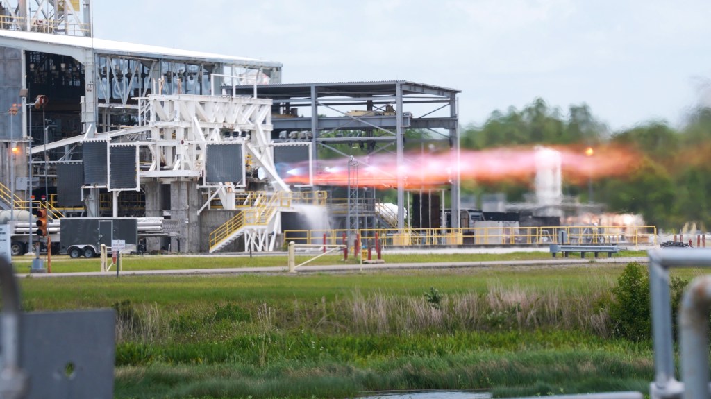 Operators conduct a hot fire for Relativity Space's Aeon R thrust chamber assembly on the E-1 Test Stand at NASA's Stennis Space Center in 2024; commercial companies article cover