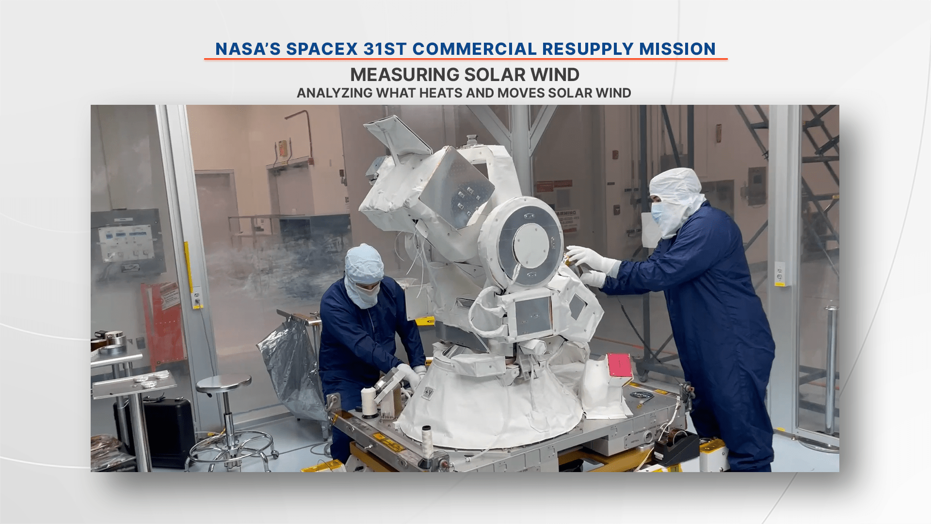 A worker prepares the CODEX (COronal Diagnostic EXperiment) instrument for launch.