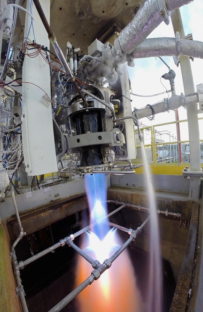 NASA engineers conduct a test of a methane-fueled 2K thruster on the E-3 Test Stand