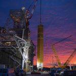 Crew at Stennis Space Center installing the first flight core stage for SLS