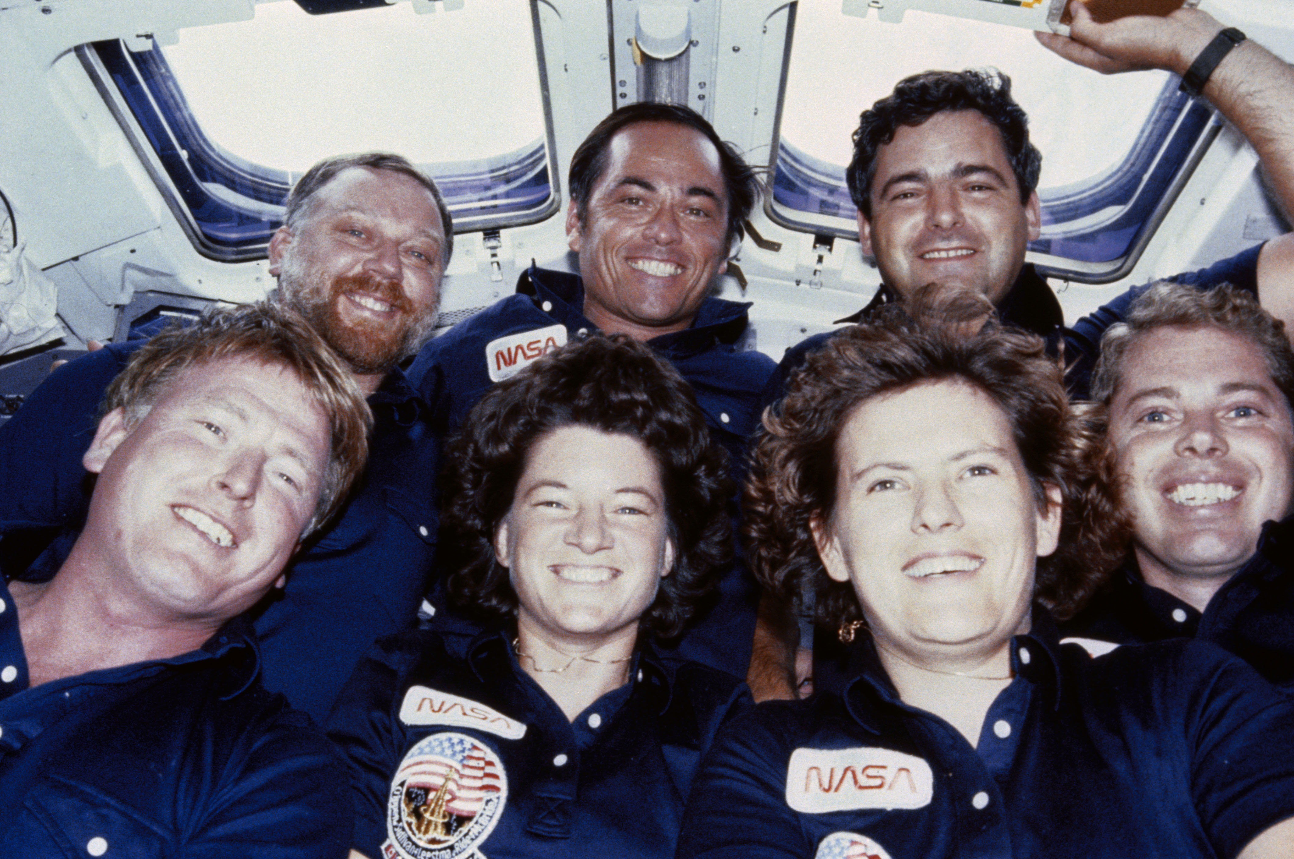 Traditional inflight photo of the STS-41G crew on Challenger’s flight deck