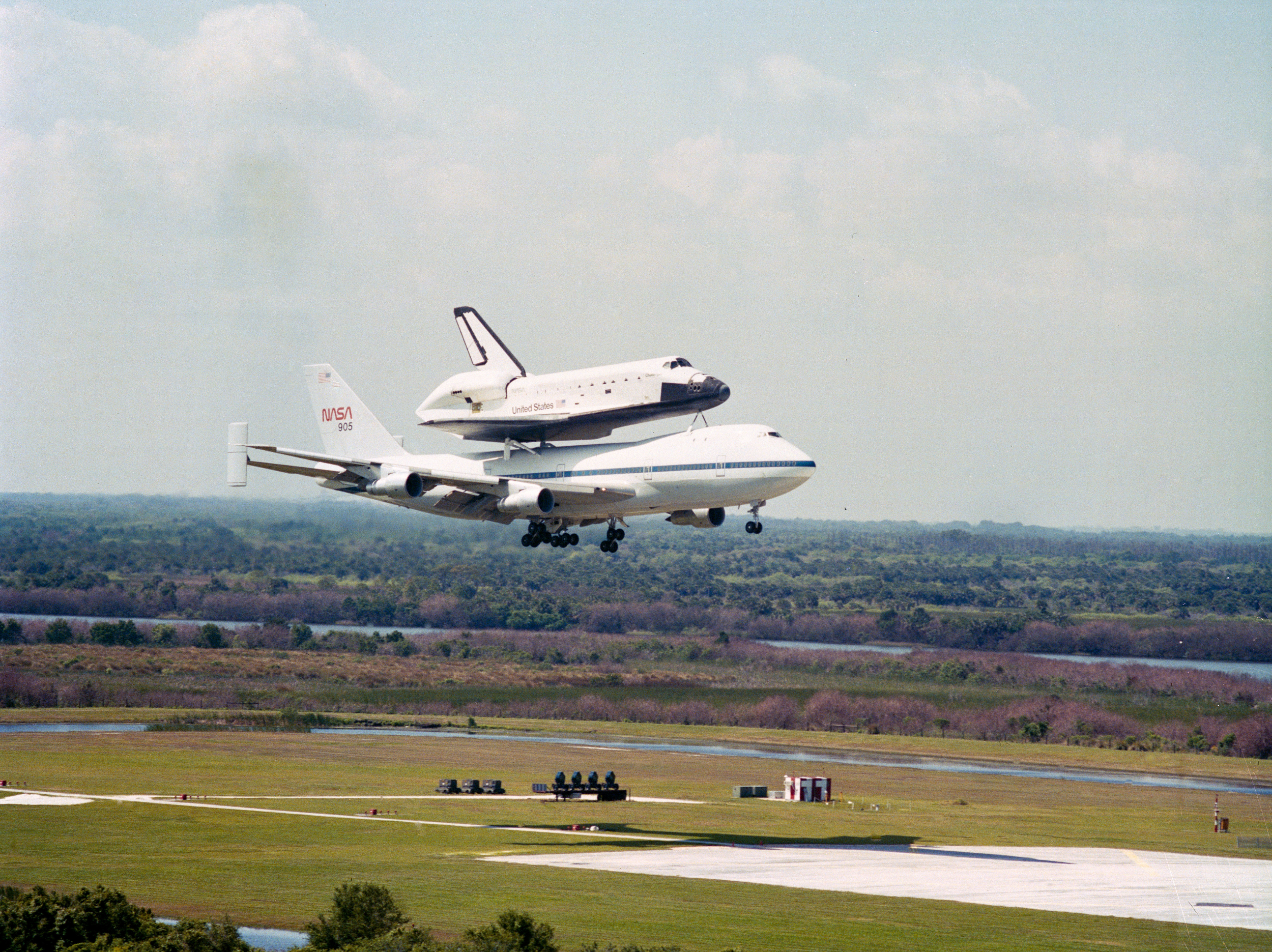 Space shuttle Challenger returns to NASA’s Kennedy Space Center (KSC) in Florida atop a Shuttle Carrier Aircraft following the STS-41C mission