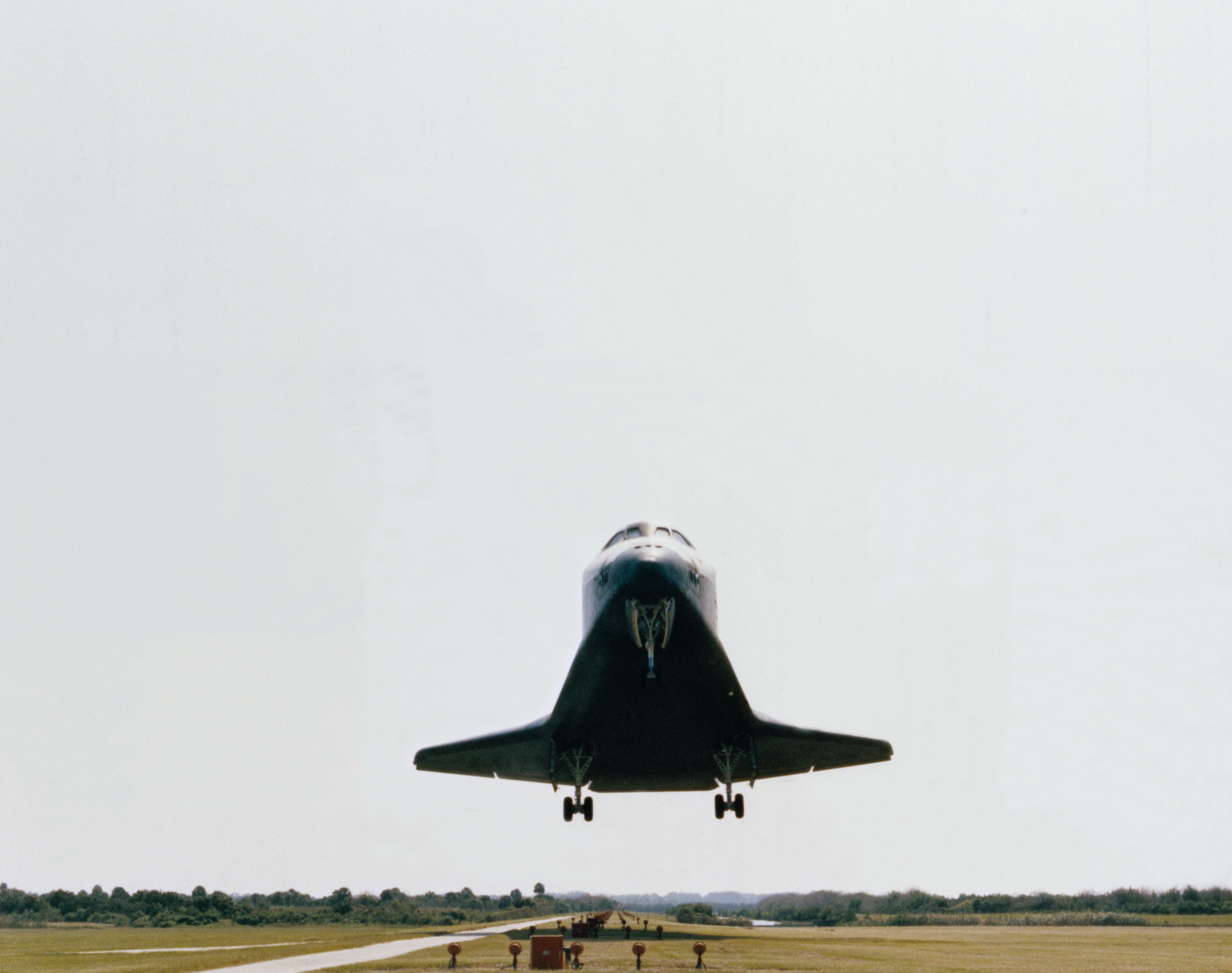 Space shuttle Challenger moments before touchdown at N KSC at the end of the STS-41G mission