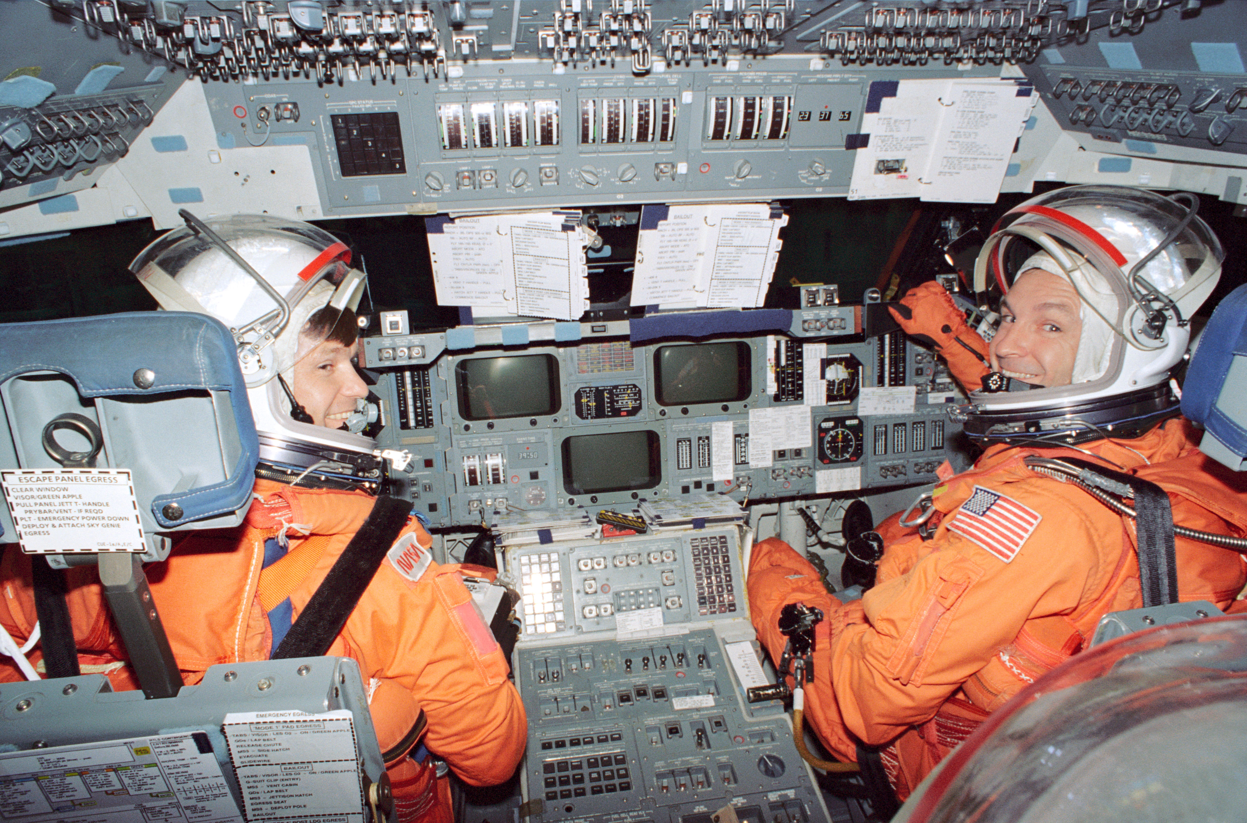 Donald R. McMonagle and Curtis R. Brown prepare for Atlantis' deorbit and reentry