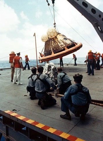 Sailors haul Yankee Clipper aboard the Hornet