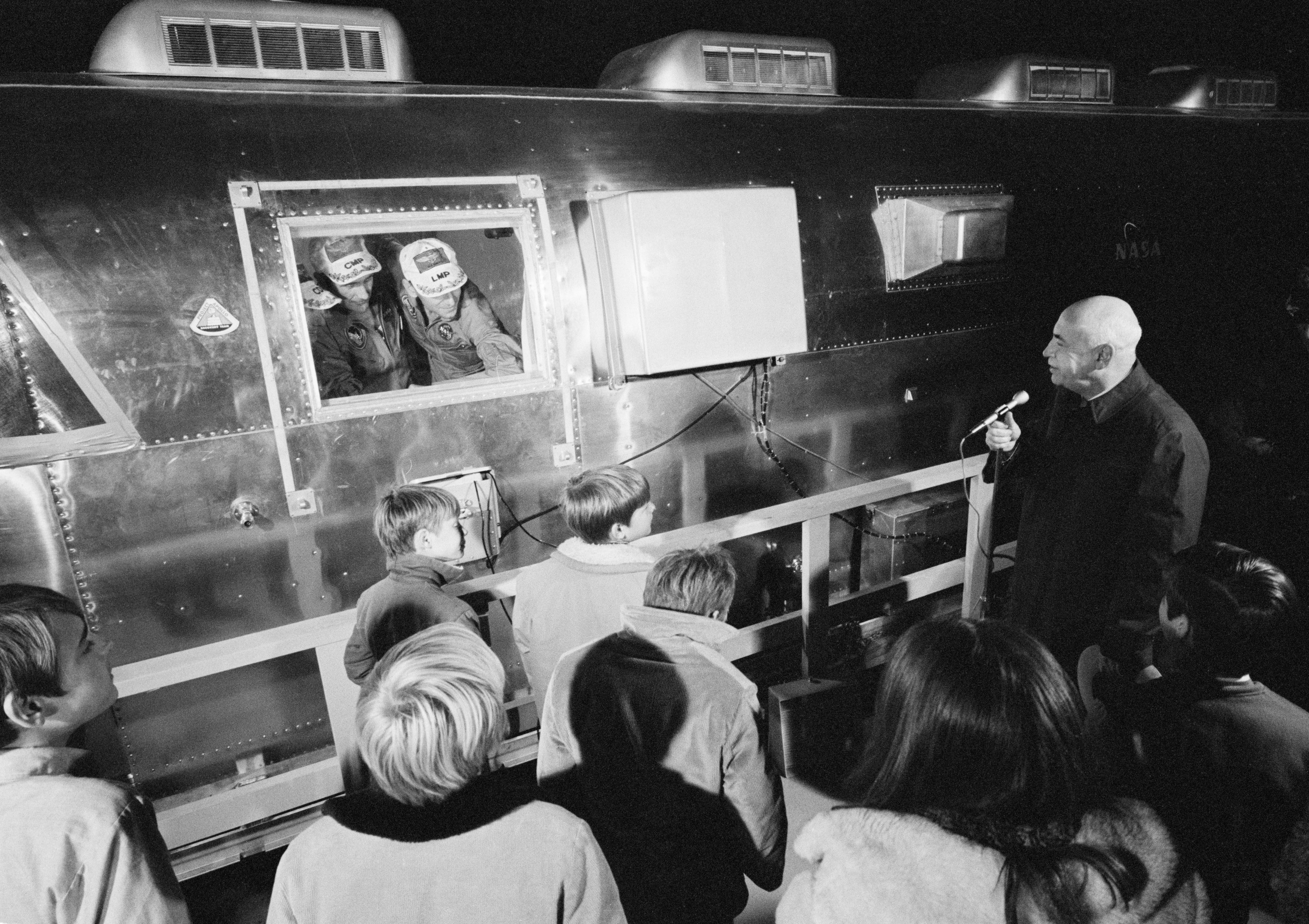 Robert R. Gilruth, director of the Manned Spacecraft Center, welcomes the Apollo 12 astronauts home