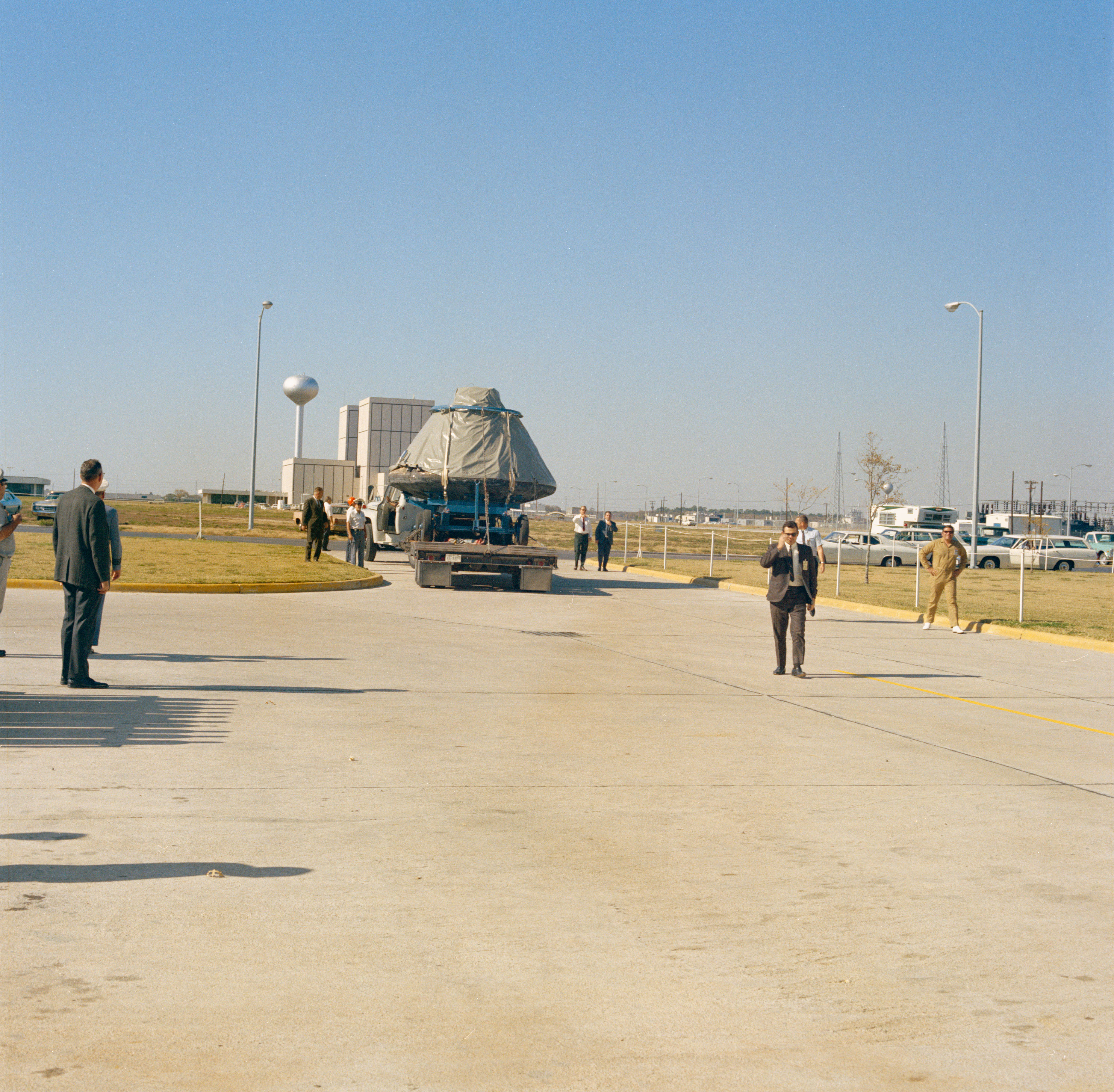 The Apollo 12 Command Module Yankee Clipper arrives at the Lunar Receiving Laboratory (LRL) at the Manned Spacecraft Center