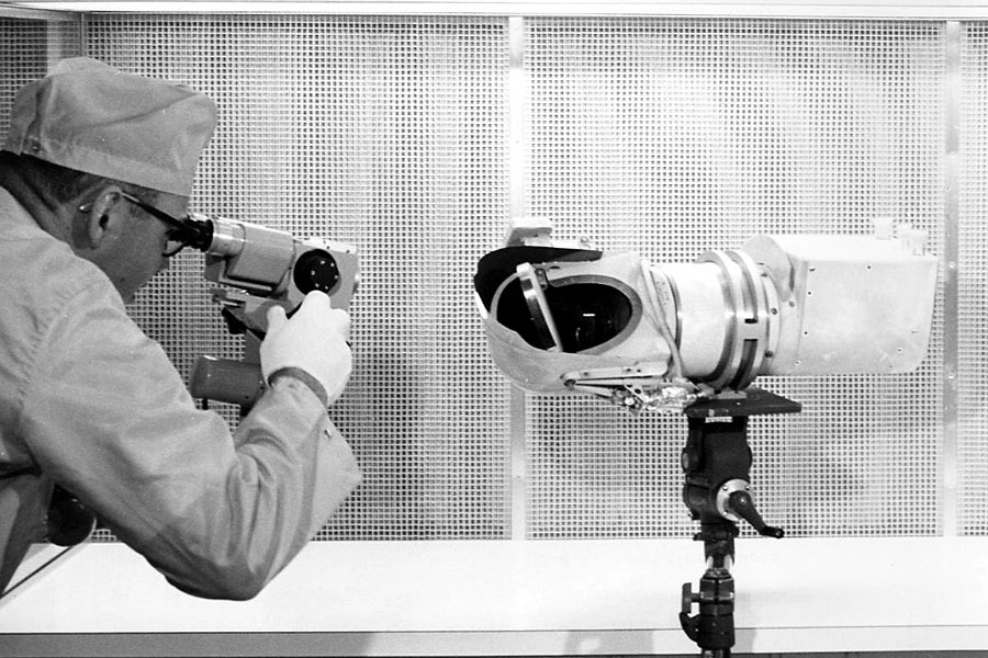 A technician examines the Surveyor 3 camera returned by Apollo 12