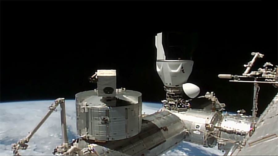 The SpaceX Dragon spacecraft with four Expedition 72 crew members aboard is pictured docked to the Harmony module's space-facing port less than an hour after undocking from Harmony's forward port. Credit: NASA TV