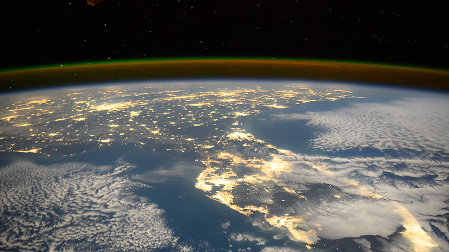 As the International Space Station soared 257 miles above, NASA astronaut Suni Williams captured this image of Florida at night. City lights illuminate the state and both the Gulf and Atlantic coasts are visible in this image.