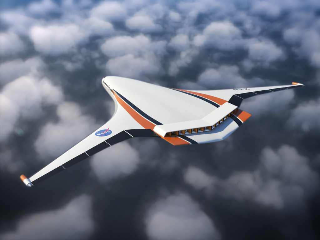 A rear-view rendering of a blended wing body aircraft with distributed fans across the top rear of the vehicle as it flies across a blue sky with white clouds in the background. The NASA insignia is displayed on the left wing, and the words “N3-X” are written on the right wing.