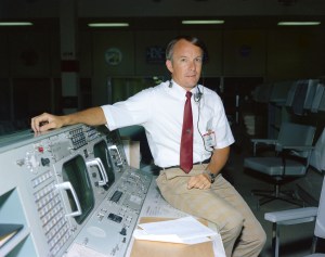 Gerry Griffin is pictured at the Flight Director Console at the Mission Control Center in Houston. Credit: NASA