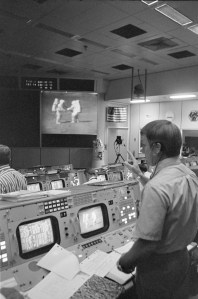 erald D. Griffin, foreground, stands near his console in the Mission Operations Control Room (MOCR) during Apollo 15's third extravehicular activity (EVA) on the lunar surface. Credit: NASA