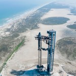 Rocket viewed from above sitting on launchpad.