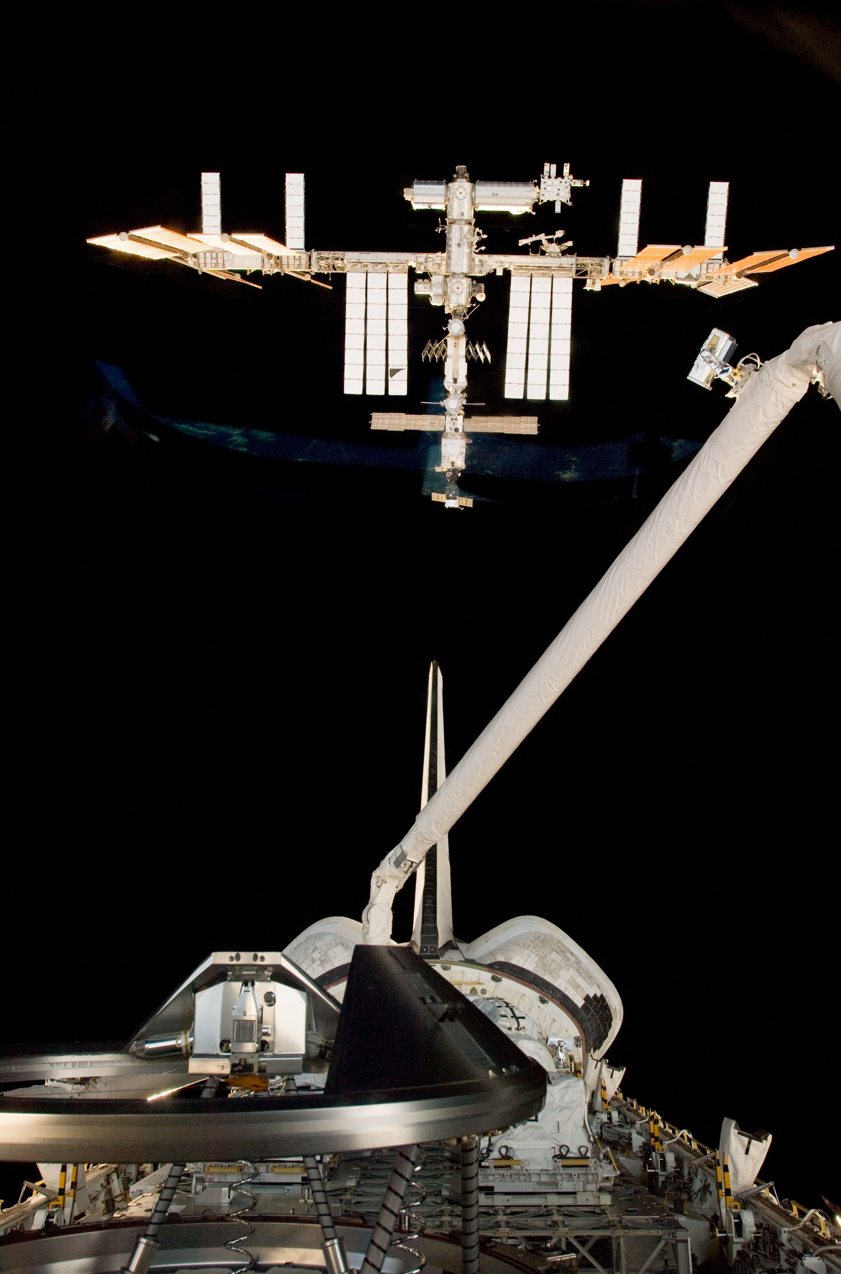 View of the space station from Atlantis during the rendezvous pitch maneuver