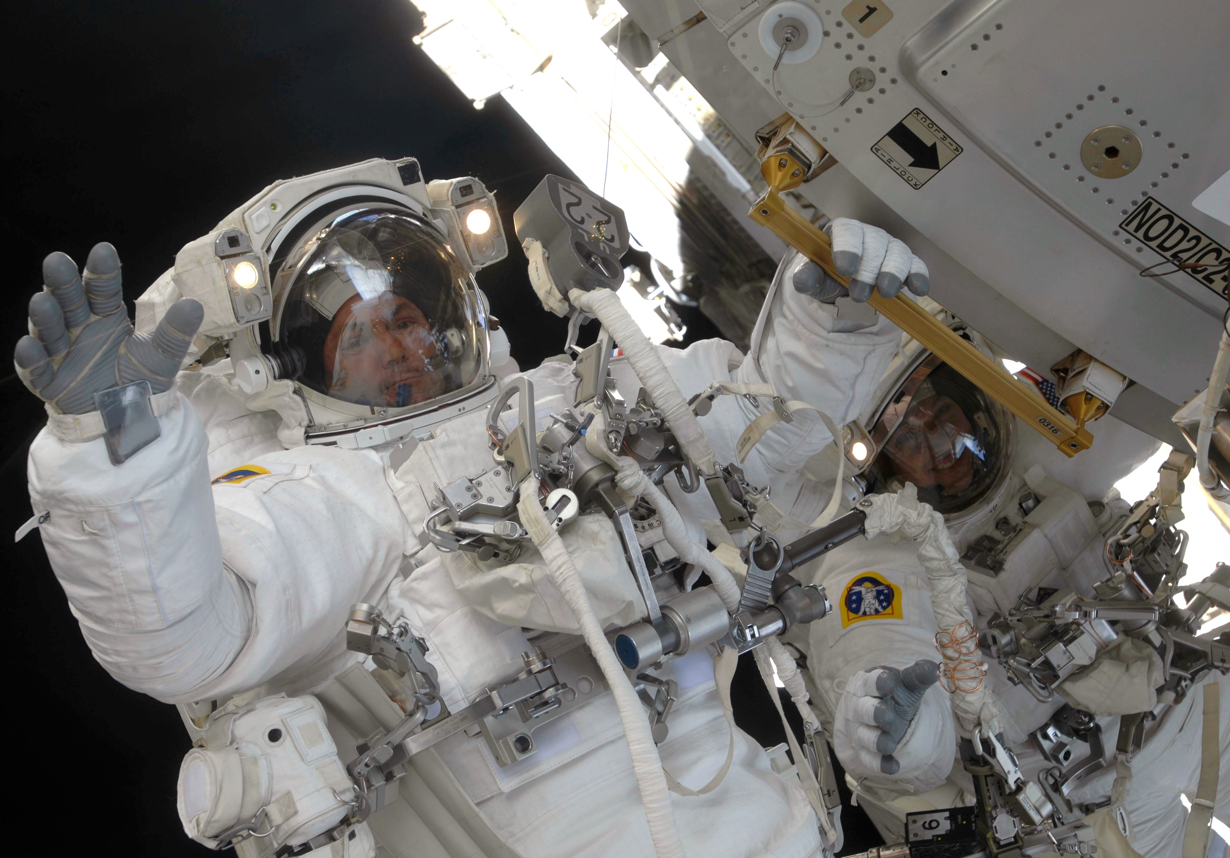 Michael J. Foreman, left, and Randolph J. Bresnik during the mission’s second spacewalk