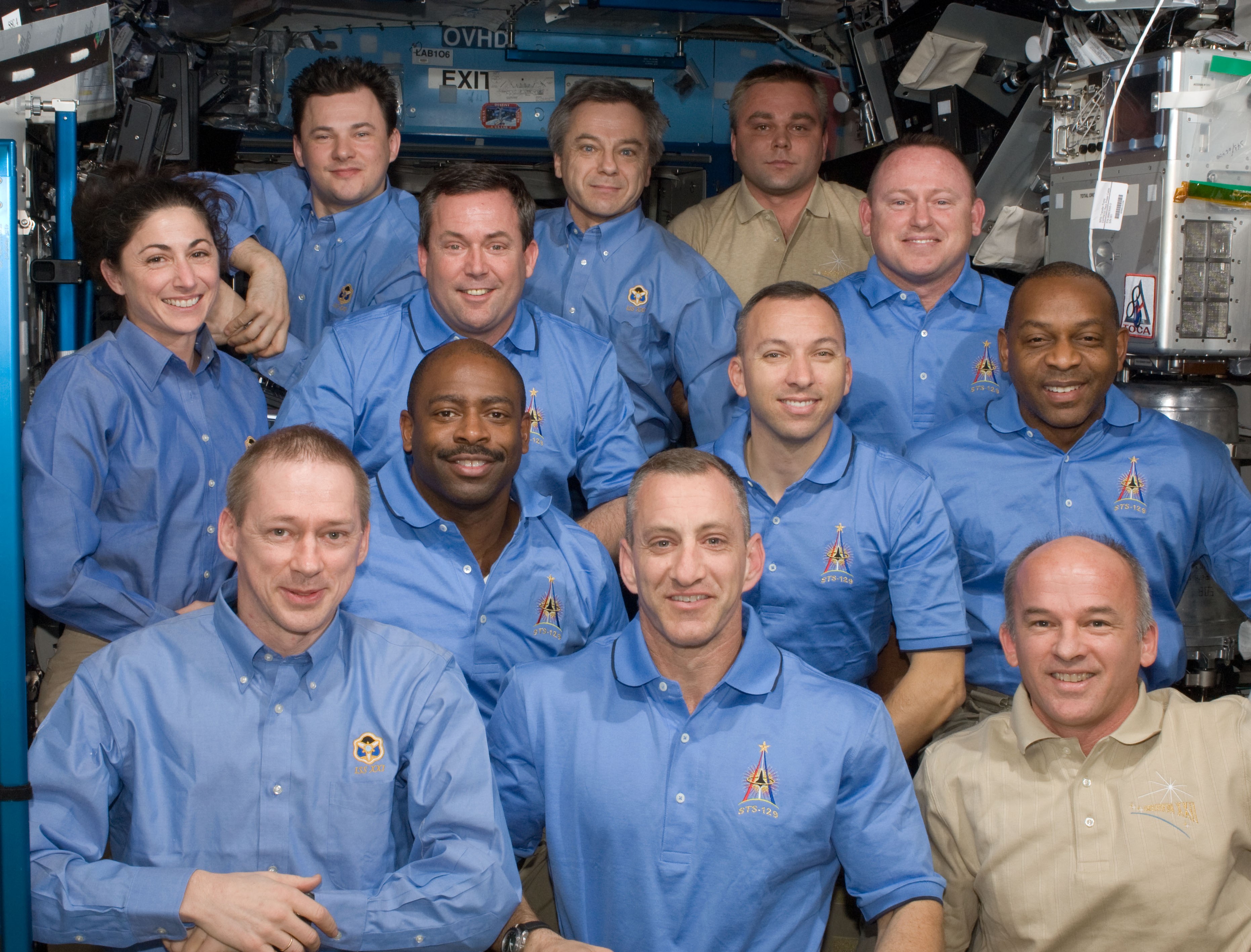 The 12 members of Expedition 21 and STS-129 pose for a final photograph