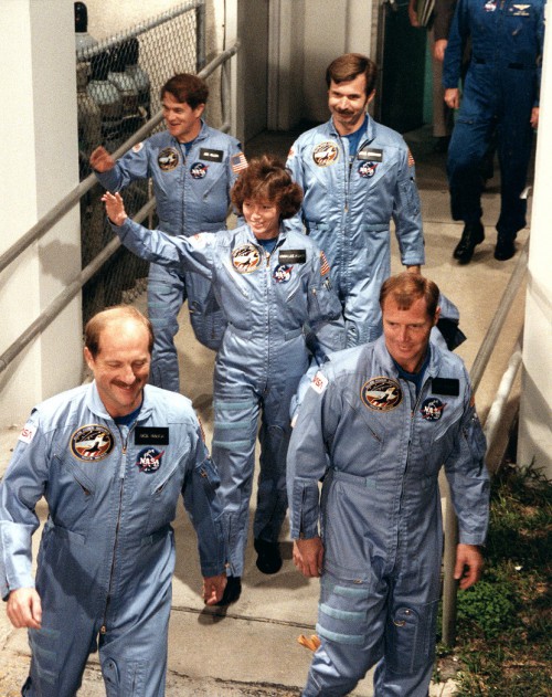 The STS-51A crew leaves crew quarters on their way to Launch Pad 39A