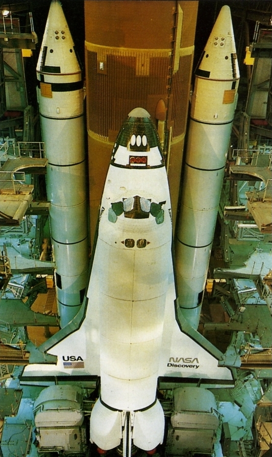 The completed stack prepares to leave the VAB for the rollout to Launch Pad 39A