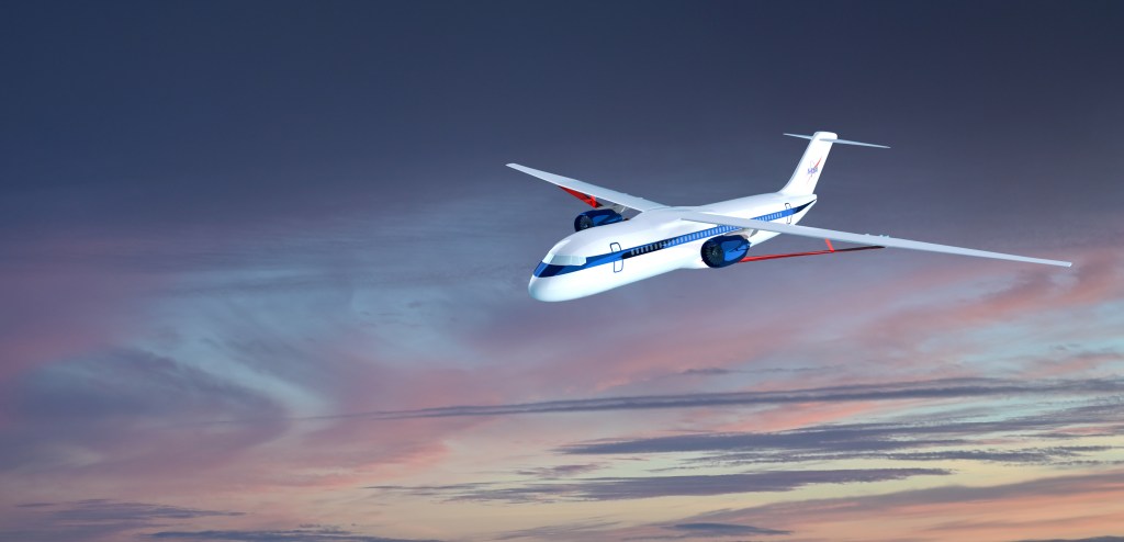 A futuristic airliner with long, skinny wings flies in sunset-lit skies.