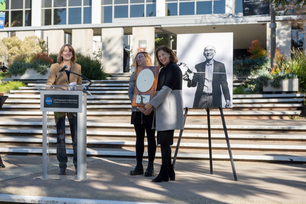 When Stone stepped down as JPL director in 2001, he received a spare cover of the Voyager Golden Record. At the trail dedication, his daughter Janet (left) returned it, saying, “This iconic piece of space history belongs now back in institutional hands, where it will be best managed for posterity.”