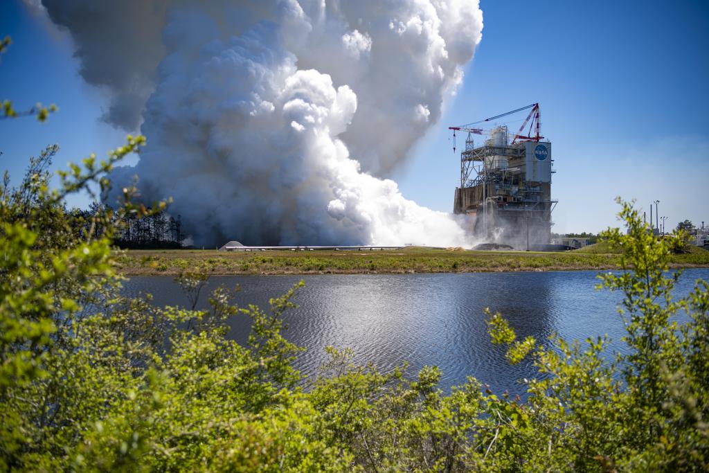 a plume of smoke vapor cloud erupts and rises towards the sky during an RS-25 engine certification test series April 3 on the Fred Haise Test Stand at NASA’s Stennis Space Center.