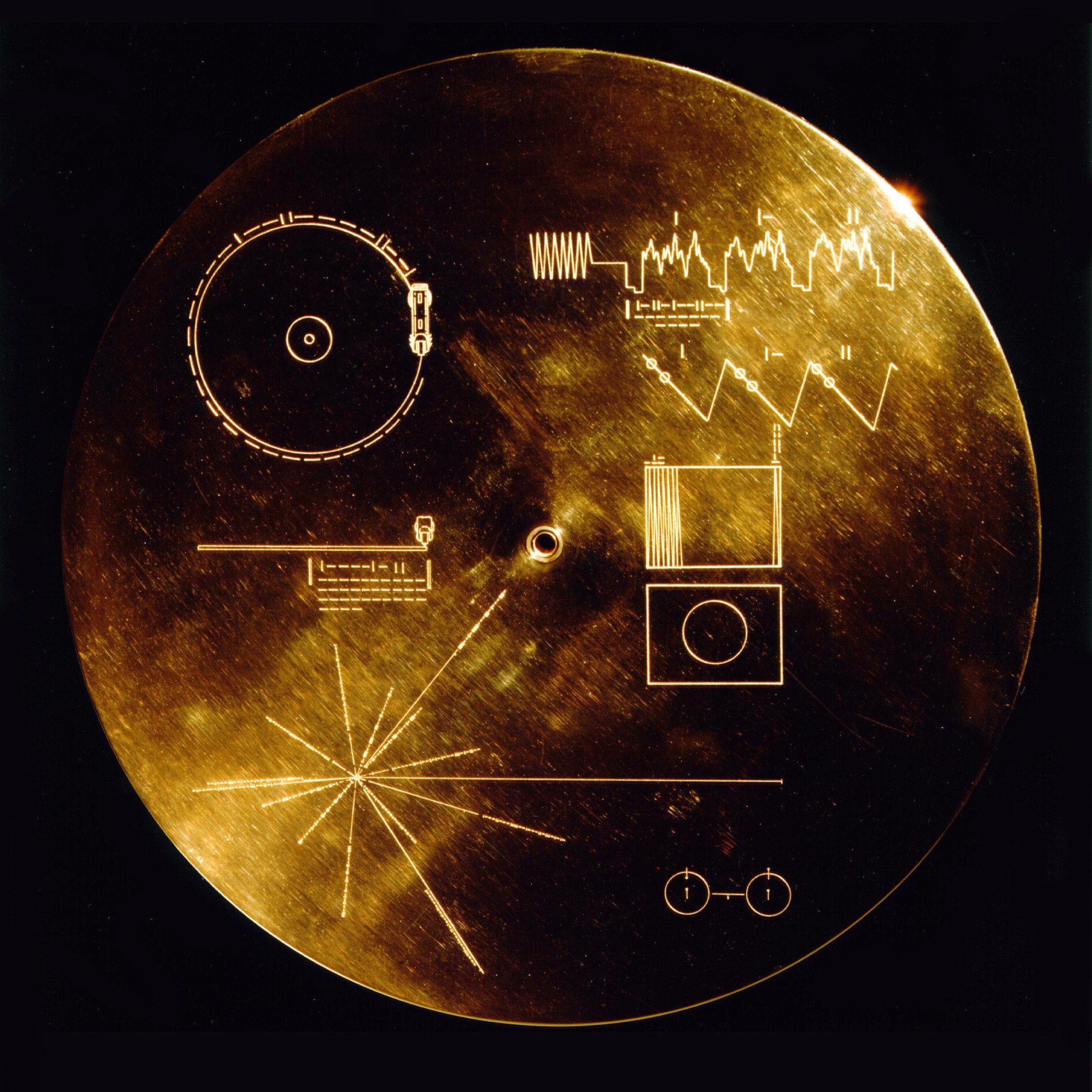 Voyager 1 and 2 both carry the Golden Record, a 12-inch gold-plated copper disk intended to communicate a story of our world to extraterrestrials with sounds and images that portray the diversity of life and culture on Earth.