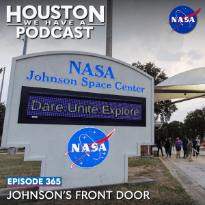 Houston We Have a Podcast Episode 365: Johnson's Front Door A sign outside the gate of JSC reads "NASA Johnson Space Center" with the NASA Meatball and the illuminated slogan "Dare, Unite, Explore."