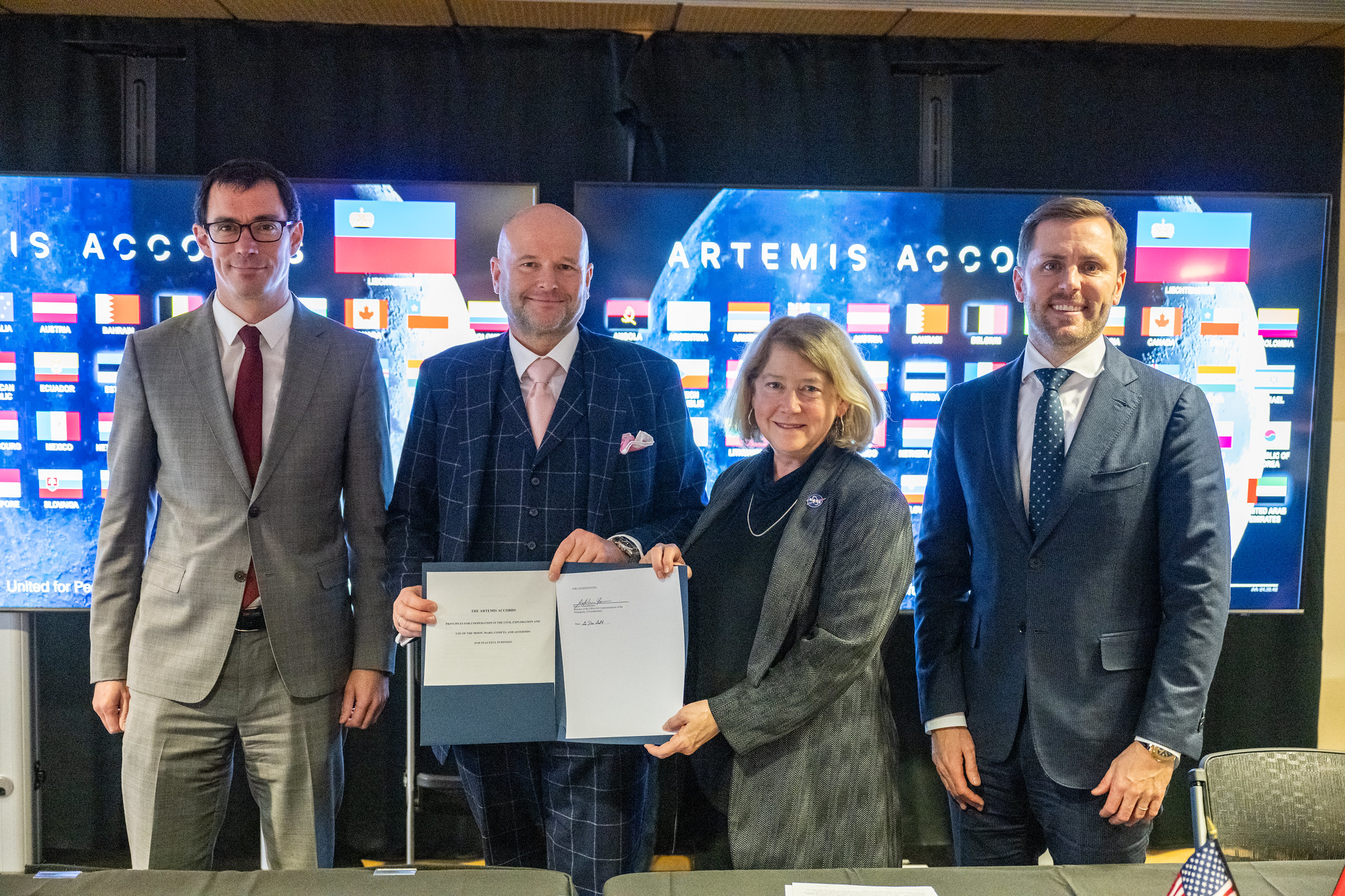 From left to right, Ambassador of the Principality of Liechtenstein to the United States of America Georg Sparber, Director of the Office for Communications of the Principality of Liechtenstein Dr. Rainer Schnepfleitner, NASA Deputy Administrator Pam Melroy, and Ambassador Extraordinary and Plenipotentiary to the Swiss Confederation and to the Principality of Liechtenstein Scott Miller, pose for a group photo during an Artemis Accords signing ceremony, Friday, Dec. 20, 2024, at the Mary W. Jackson NASA Headquarters building in Washington. The Principality of Liechtenstein is the 52nd country to sign the Artemis Accords, which establish a practical set of principles to guide space exploration cooperation among nations participating in NASA’s Artemis program. Photo Credit: (NASA/Keegan Barber)