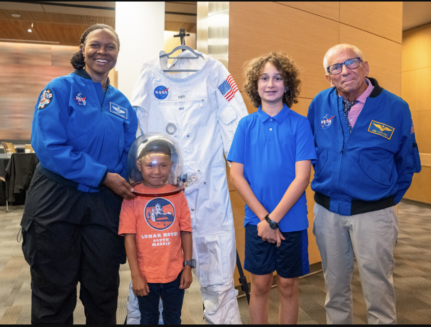 Former NASA astronauts Yvonne Cagle and Kenneth Cockrell pose with Eli Toribio and Rhydian Daniels at the University of California, San Francisco Bakar Cancer Hospita