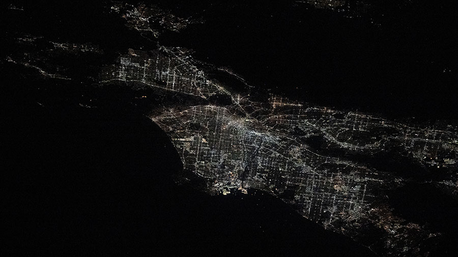 City lights illuminate the Los Angeles, California, metropolitan area about 2:30 a.m. local time on Jan. 10, 2025, as wildfires rage around nearby suburbs in this photograph from the space station.