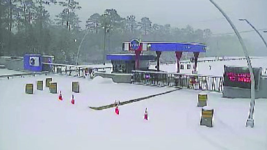 view of security gate at Stennis Space Center as snow covered the area