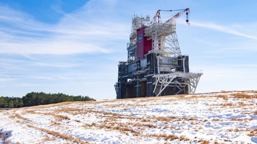 a test stand at Stennis Space Center lightly covered in snow