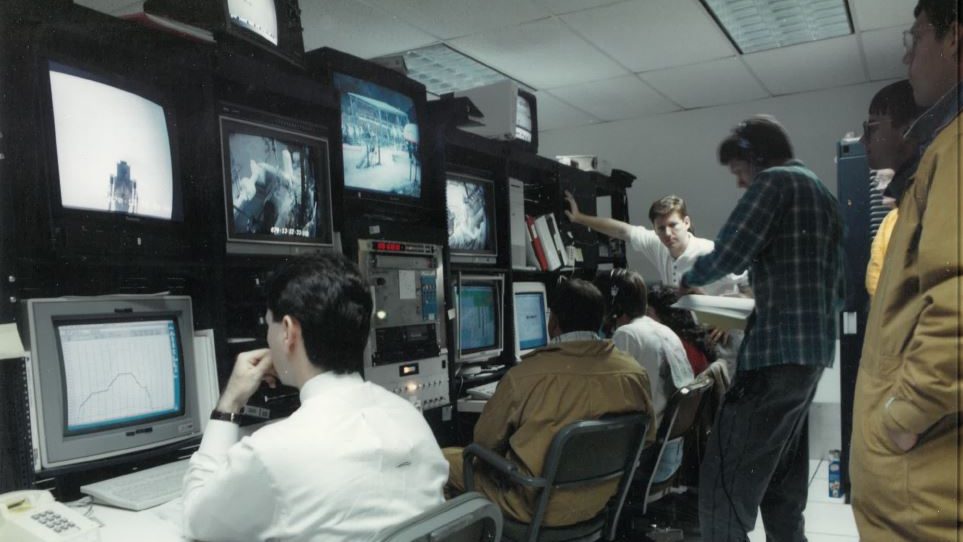 An image shows the Diagnostic Testbed Facility team working in the test control center