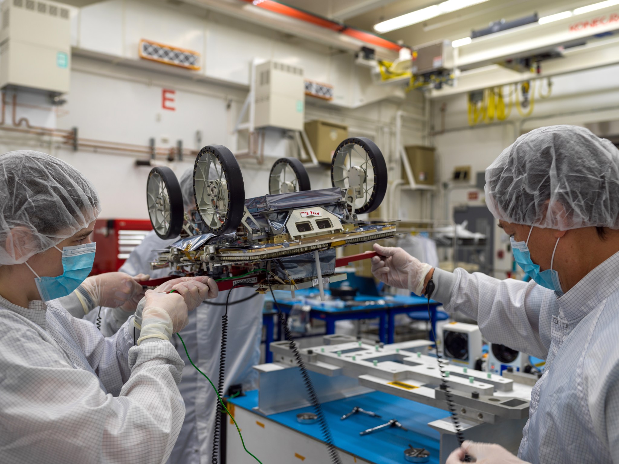 Members of a JPL team working on NASA’s CADRE