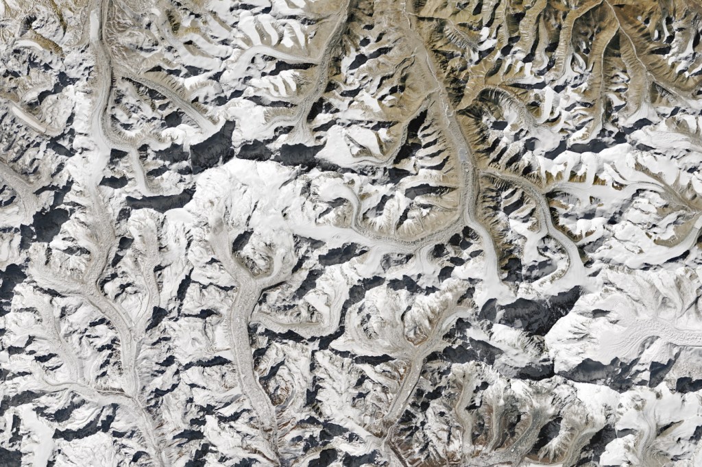 Winters are bitterly cold at “the roof of the world,” the high-altitude region of Asia that includes the Himalaya mountains. And yet, on the glaciated landscape around Mount Everest, snow cover in recent winters has been limited to the mountains’ higher elevations. According to scientists tracking the region’s snow and ice, a combination of warmer and drier conditions has contributed to this upward creep of the winter snow line—the elevation at and above which seasonal snow persists on glacial ice. The shift has implications for regional water security and fire activity.