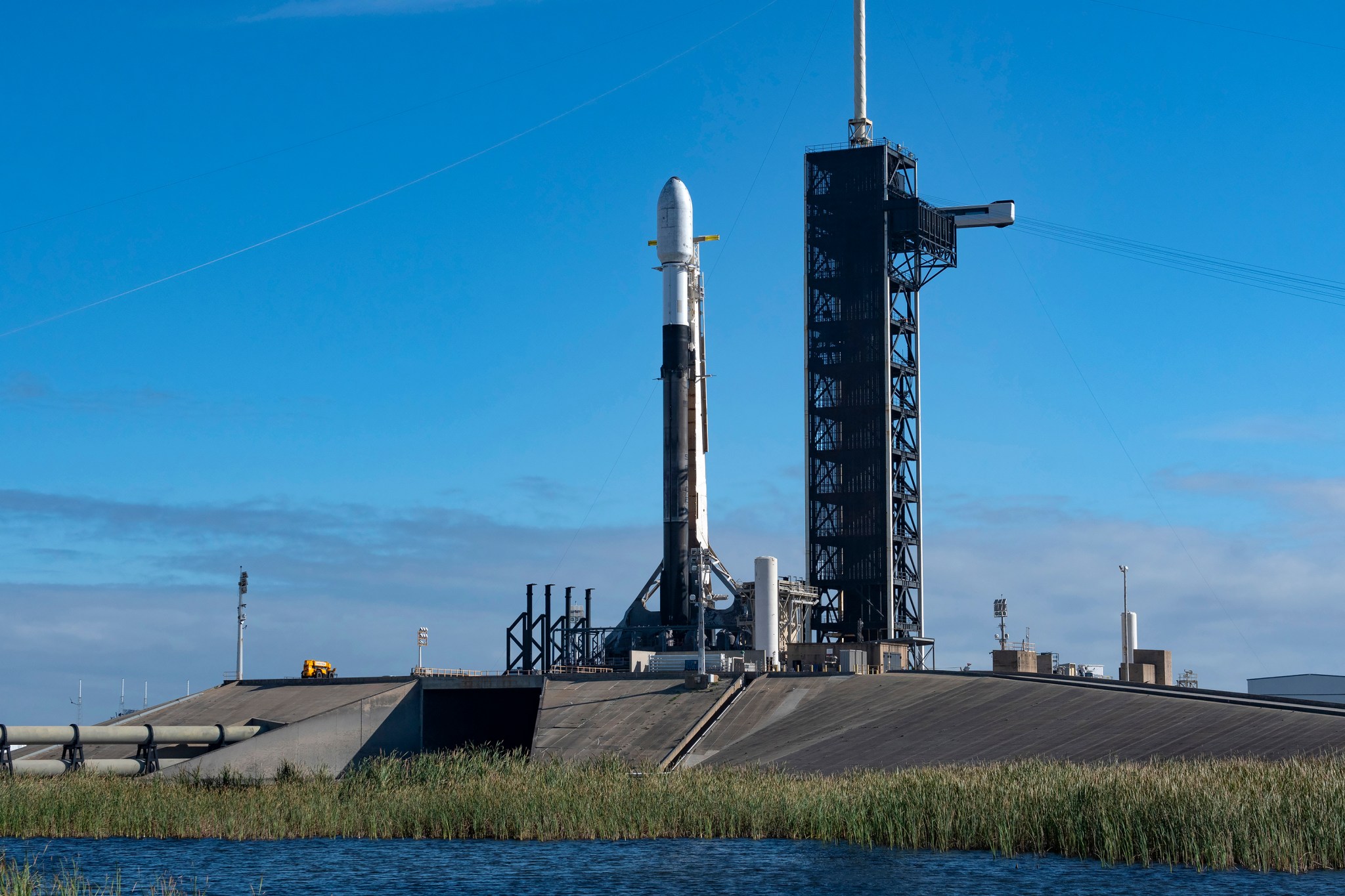 A SpaceX Falcon 9 rocket stands vertical on Tuesday, Feb. 25, 2025, at Launch Complex 39A at NASA's Kennedy Space Center ahead of Intuitive Machines' IM-2 mission as part of the agency's Commercial Lunar Payload Services initiative and Artemis campaign.