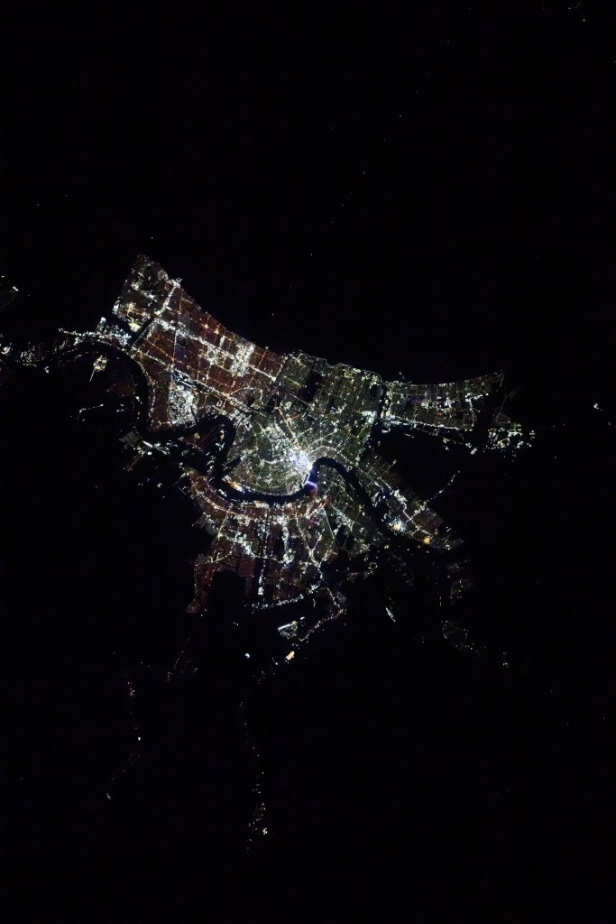 iss072e115732 (Oct. 26, 2024) --- The city lights of New Orleans, Louisiana, and its suburbs along the Mississippi River and on the shoreline of Lake Pontchartrain are pictured at approximately 1:16 a.m. local time from the International Space Station as it orbited 258 miles above.